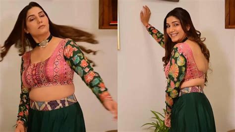 Sapna Choudhary Looks Electrifying In Green And Pink Lehenga With ...