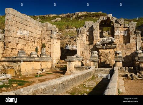 Nymphaeum monument building with fountain statue of River god Kestros ...