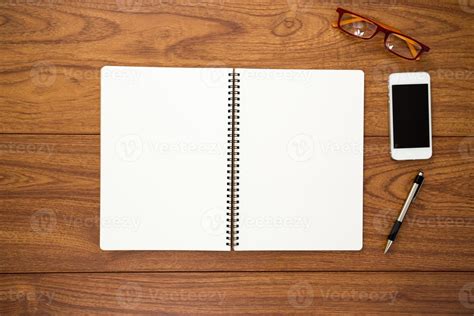 Blank diary on wood background 1048655 Stock Photo at Vecteezy