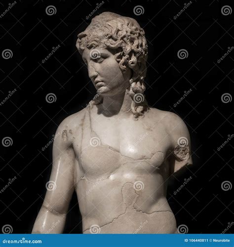 Statue of a Young Naked Roman Man at Black Background, Rome, Italy 