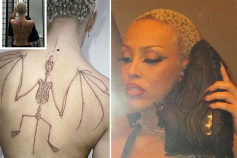 Doja Cat flaunts eye-catching bat skeleton back tattoo, reveals hidden ...