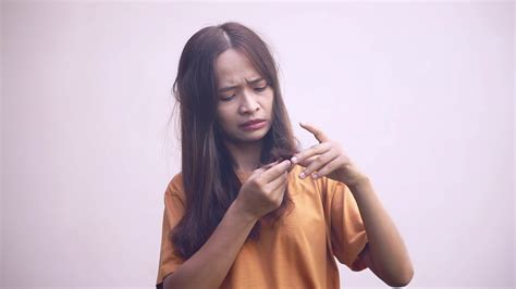 asian woman  itchy head  dandruff  stock video