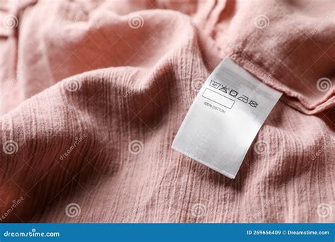 Clothing Label on Beautiful Pink Garment, Closeup Stock Image - Image of care, beautiful: 269656409