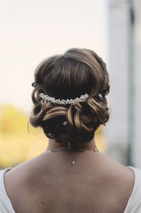 Curled Bridal Updo with Pearl Hair Accessory