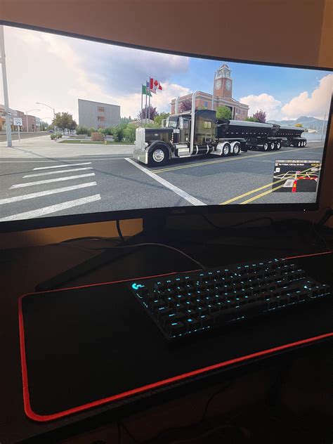 Driving a real truck by day, fake truck by night : trucksim