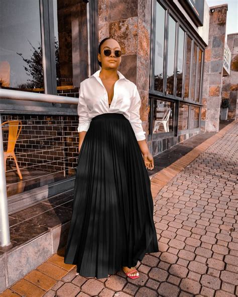 black pleated maxi skirt