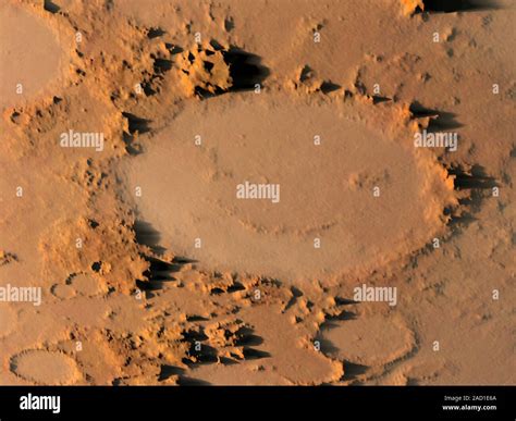 Happy face crater, Mars. Computer artwork of the Galle crater, known as ...