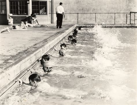 Bob's Naked Guys: Stanford swimming team practicing in the pool. c. 1930.