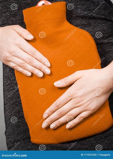 Girl Having Stomach Ache, Holding Hot Water Bottle Stock Photo - Image