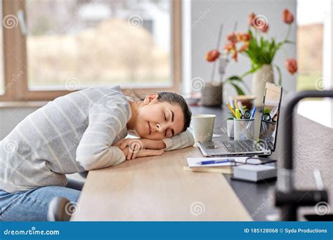 Tired Woman Sleeping on Table with Laptop at Home Stock Photo - Image ...