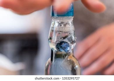 how to open japanese soda bottle