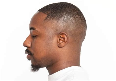 15 Sleek Buzz Cut Ideas For Black Men in 2024