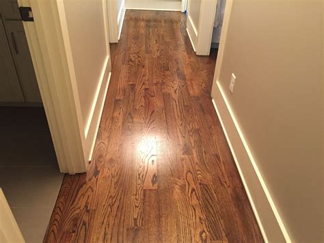 Newly sanded #2 Red Oak Hardwood Flooring. Minwax Espresso Stain