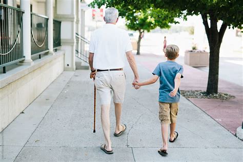 "Grandfather And Grandson Walking Hand In Hand" by Stocksy Contributor ...