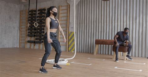 Woman Doing Squats in the Gym · Free Stock Video