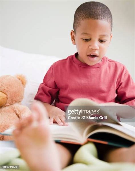 683 Barefoot Boy Reading Stock Photos, High-Res Pictures, and Images - Getty Images