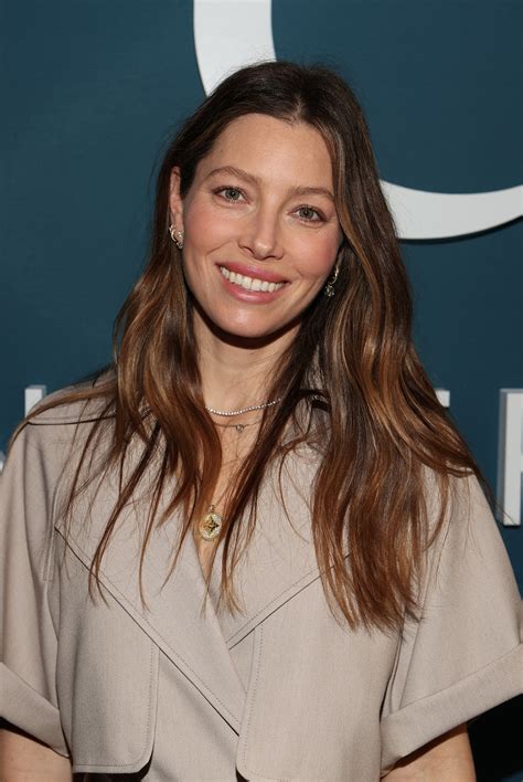 Jessica Biel looks unrecognizable as 80s housewife turned axe-murderer