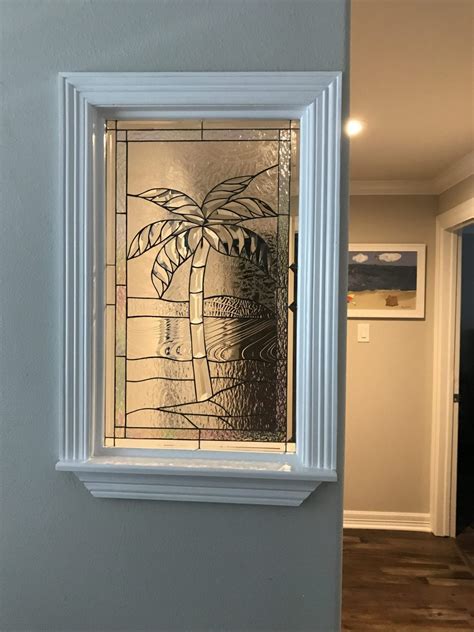 Triple Paned Beveled Palm Tree Used Within A Partition