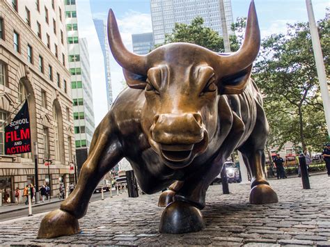 The Symbolism of the Wall Street Charging Bull Sculpture - Liaison Gallery