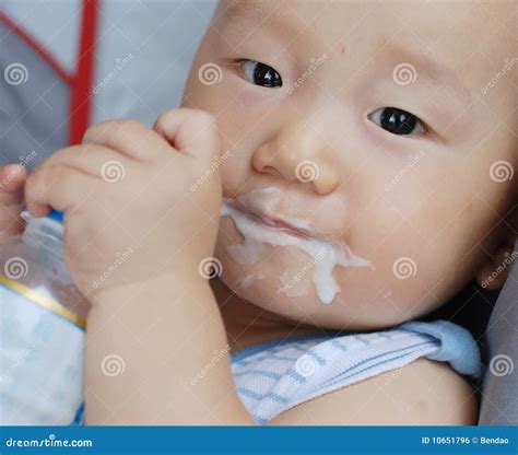 Baby Boy Eating Acidophilus Milk Stock Photo - Image of cute, drink ...