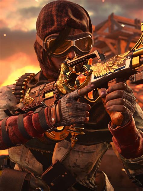 Download Samantha Maxis With Golden Eagle Rifle Wallpaper | Wallpapers.com