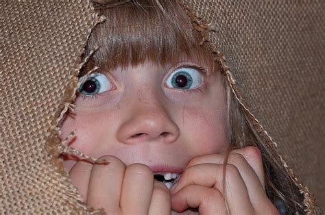 person human girl child eyes face frightened scared anxious