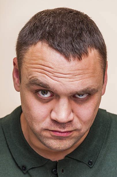 person showing  suspicious eyes stock  pictures