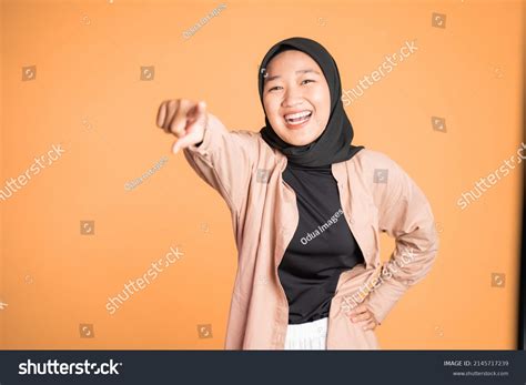 woman finger pointing  fun  stock photo  shutterstock
