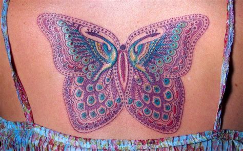 Butterfly & Peacock tattoo. Tattoo by Daemon Rowanchilde. www ...