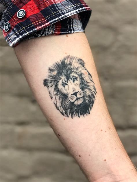 lion meaning tattoo 8