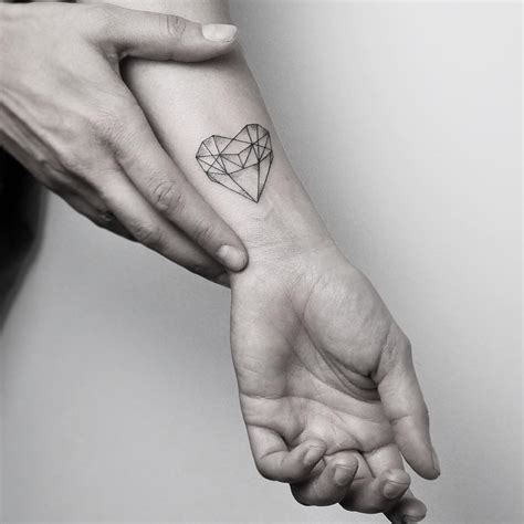 Geometric heart by @mariafernandeztattoo - Tattoogrid.net