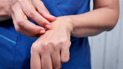 Sensitive skin allergic concept, Woman itching on her arm have a red