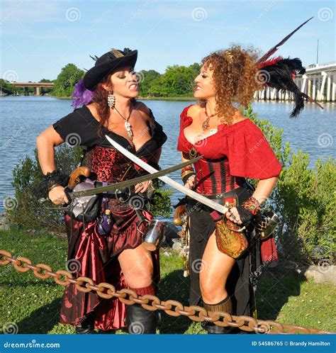 Beautiful Women in Pirate Attire Duel Editorial Image - Image of