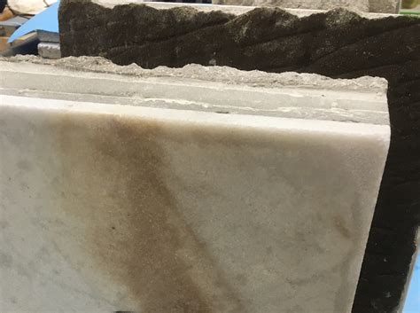 Case Study: Staining of Exterior Marble Tile Caused by Cold Applied