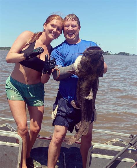 My husband Chad and I holding up... - Ashley Dead Eye Jones