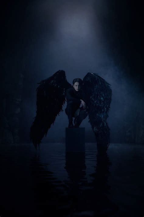 Download Bts Jung Kook Cute Dark Angel Wallpaper | Wallpapers.com