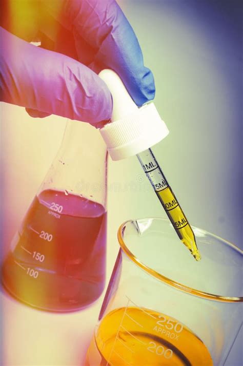 Science Beaker Experiment stock photo. Image of pipet - 79392504