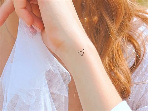 Heart Tattoo On Hand