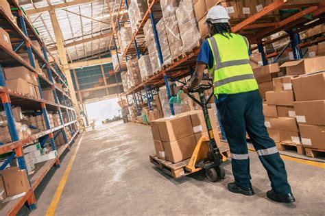 warehouse worker  hand pallet trucks loading cargo  shipping