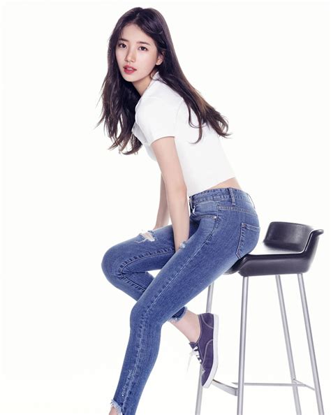 Download Bae Suzy In Chair Photoshoot Wallpaper | Wallpapers.com