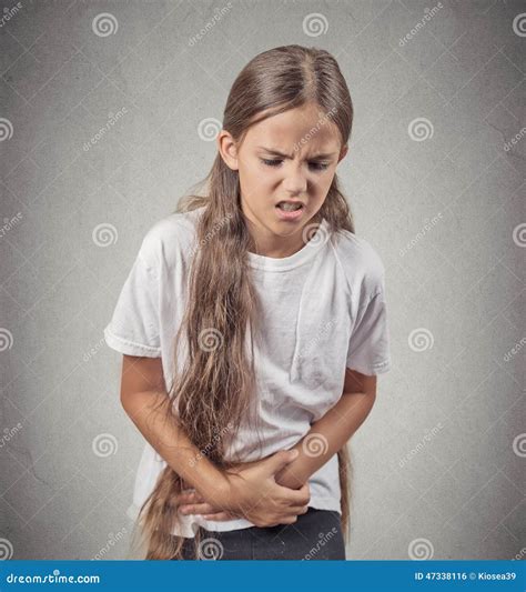 Teenager Girl with Stomach Pain Stock Photo - Image of abdomen