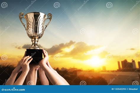 Winning Team Raise Trophy Cup With Digital Background, Digital A Stock ...