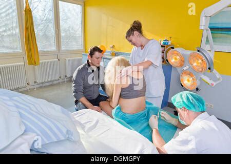 Pregnant woman epidural Stock Photo - Alamy