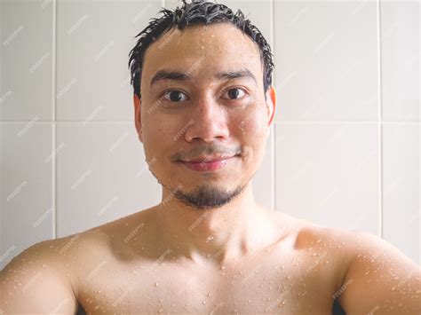 Premium Photo | Smaile and happy asian man take a selfie shot in the