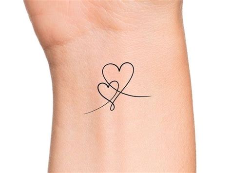 Connecting Hearts Temporary Tattoo - Etsy | Tiny wrist tattoos, Heart ...