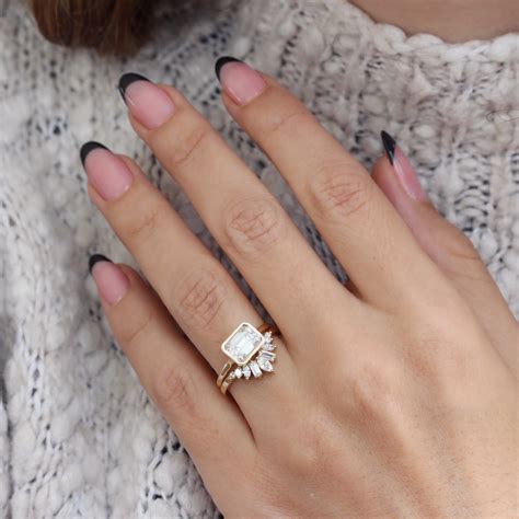 East West Emerald Cut Solitaire Bezel Set Diamond Engagement Ring With