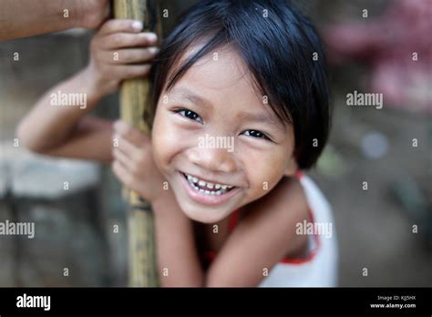 Bahnar (Ba Na) ethnic group. Young girl smiling. Portrait. Kon Tum ...