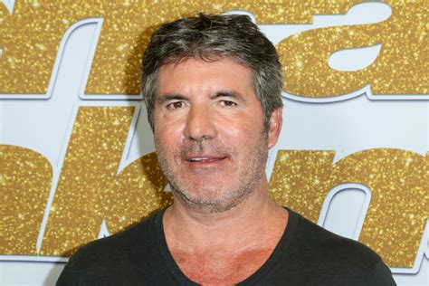 Is Simon Cowell Hiding Something? The Shocking Truth About His Son's Disability Image 15