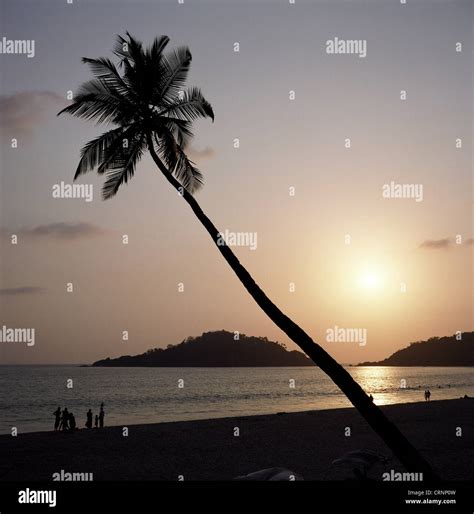 Sunset on the beach in Goa, India Stock Photo - Alamy