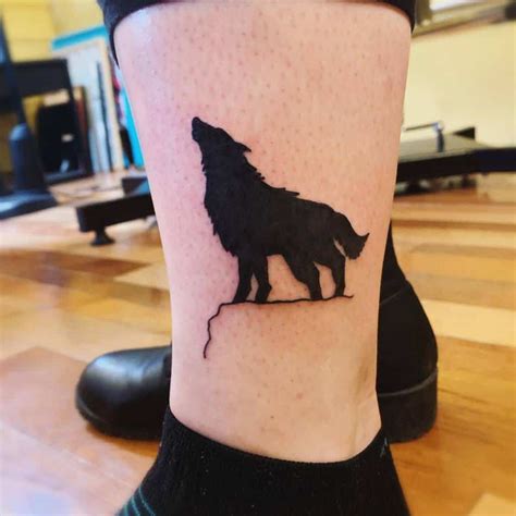 Wolf howling tattoo - loperswiki